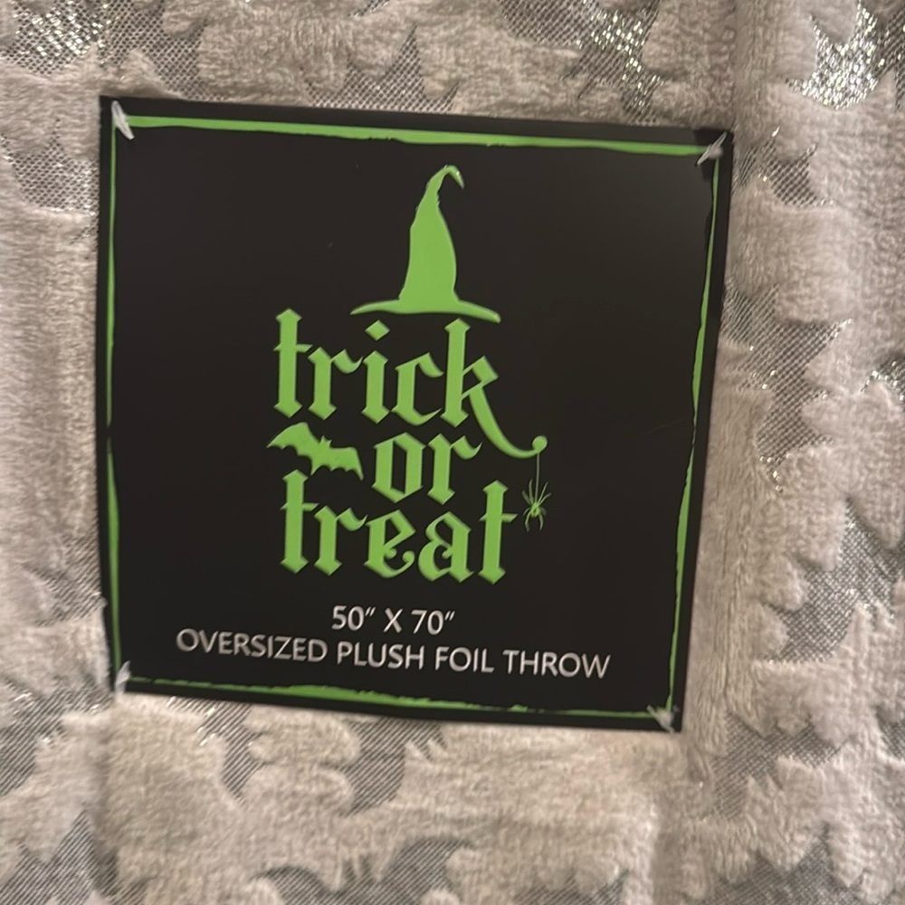 Trick or treat 50”x70” Oversized Plush Foil Throw